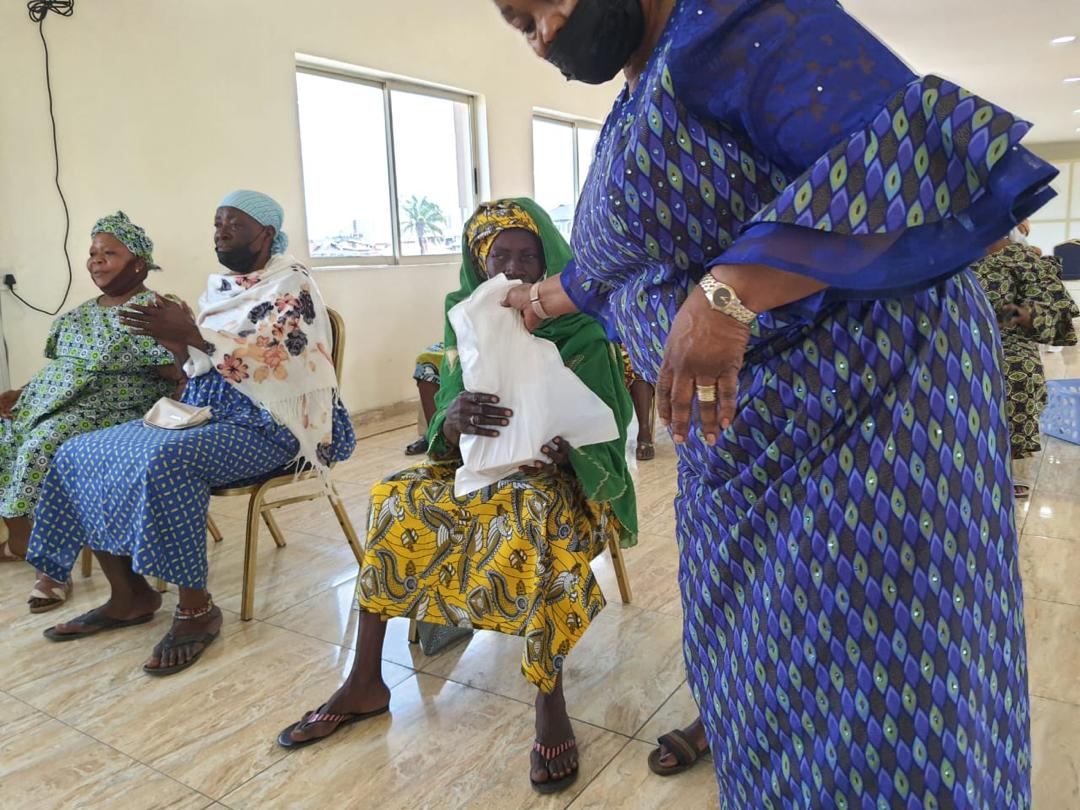 Elderly beneficiary receiving a support package